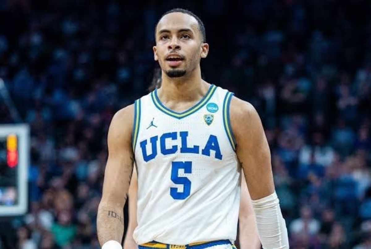 Amari Bailey wearing a UCLA basketball jersey with the number 5 during a game.